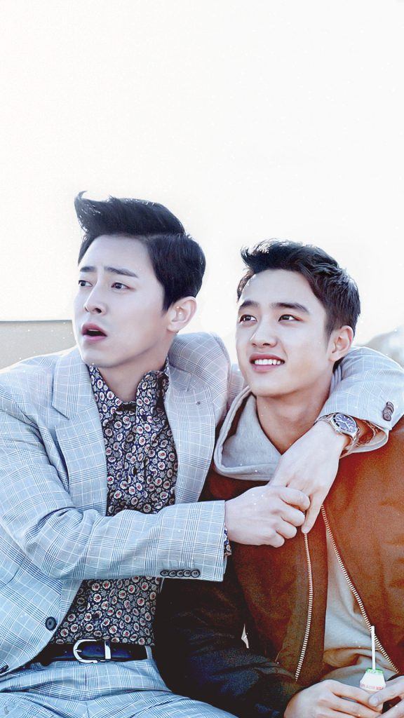 Actor Jo Jung Suk & EXO's D.O. enjoying the view on a rooftop/ CJ Entertainment 