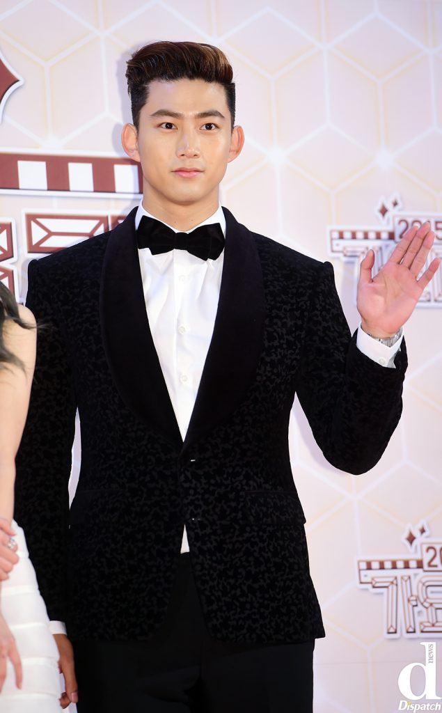 Taecyeon channels a serious and chic look with this suit. 